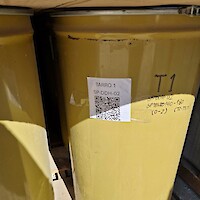 Bucket with core rejects (QR code with detail of sample)